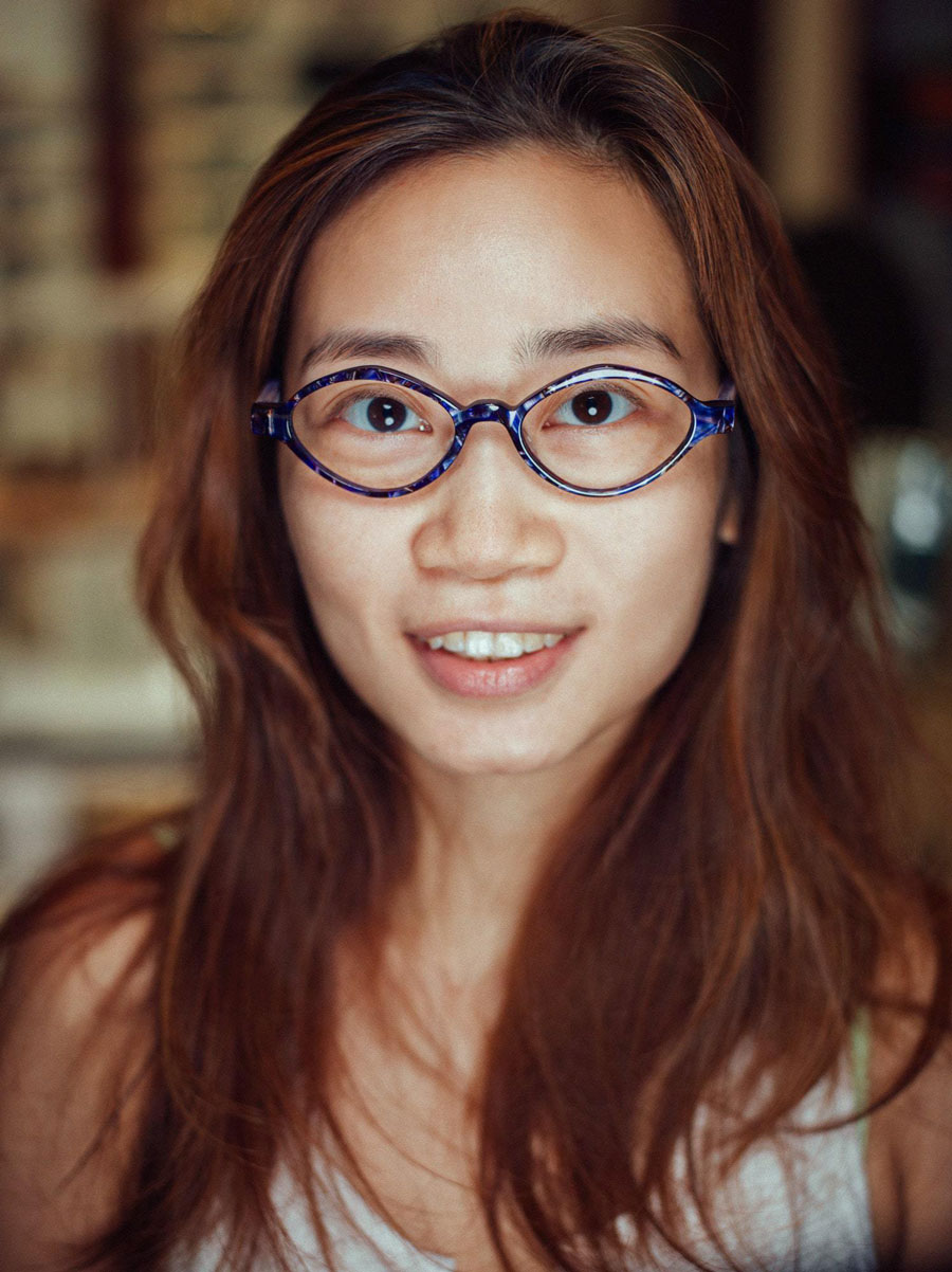 blue rounded womans glasses