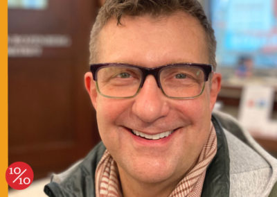 smiling male customer with glasses at 10 10 Optics
